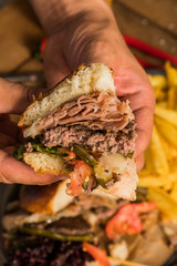 Fresh tasty burger with beacon and fryed meat and souse 