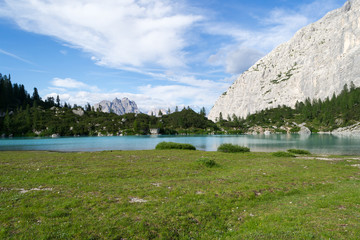 Detail shot of the wonderfull Sorapiss lake in the italian Alps, in the Dolomites mountains range close to Cortina in Veneto region, a unique place. The water of the lake is so blue it seems unreal