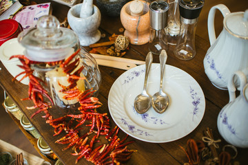 table setting with plate and spoons 