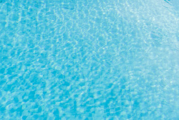surface of blue swimming pool,background of water in swimming pool.