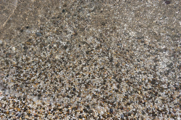 Natural background of small colored pebbles