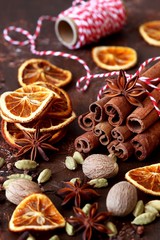 Fototapeta na wymiar Dried orange, stars anise and cinnamon sticks