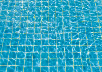 surface of blue swimming pool,background of water in swimming pool.