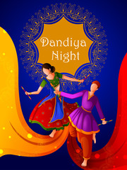People playing traditional folk dance Garba on Dandiya night celebrating Navratri during Dussehra