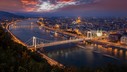 Fototapeta na wymiar Budapest, Hungary - Aerial panoramic skyline of Budapest at sunset. This view includes Elisabeth Bridge (Erzsebet Hid), Szechenyi Chain Bridge, Parliament, St. Stephen's Basilica and other landmarks