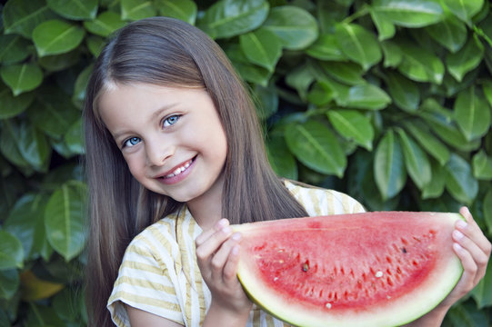 A Smiling Young Girl with Watermelon 