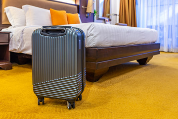 Modern small luggage in hotel