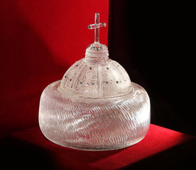 Glass crown. Crown on a red background