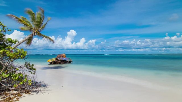 Time lapse hyperlapse of an old Sherman tank rusting in the water of the tropical beach of Flamenco in Culebra Island, Puerto Rico