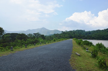 landscape of water reservoir lake with mountain background