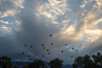 Hot air balloons in morning sunrise