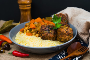 Kofta Tagine Moroccan Meatballs Served With Semolina and Vegetables