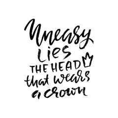 Naklejka premium Uneasy lies the head that wears a crown. Hand drawn dry brush lettering. Ink illustration. Modern calligraphy phrase. Vector illustration.