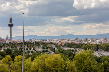 Skyline of Madrid with the communications tower El Piruli and the cemetery of Almudena in the foreground