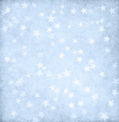 Vintage light blue paper decorated with stars.