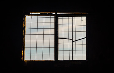 latticed window with a black background