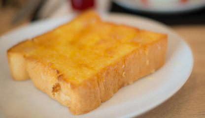 Bread on white plate.