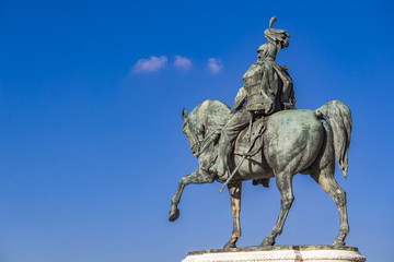 Fototapeta na wymiar Equestrian statue of Vittorio Emanuele II on Vittoriano (Altar of the Fatherland) in Rome, Italy
