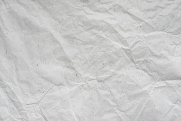 white crumpled paper texture background.