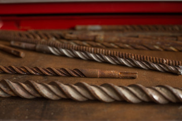 A pile of drill bits.