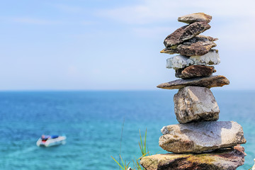 The stones are stacked together,With balance.