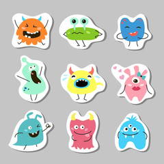 Set of stickers with cartoon monsters.