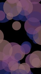Multicolored translucent circles on a dark background. Vertical image orientation. 3D illustration