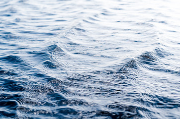 texture of blue river water with small waves