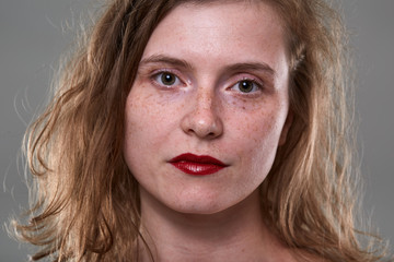 Young woman with freckles