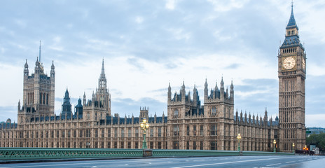 Fototapeta na wymiar Panoramic view of the Houses of Parliament, Palace of Westminster and Westminster Bridge. No people, nobody. Early morning. Covid 19 Coronavirus lockdown