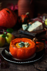 Pumpkin and pear soup with blue cheese.style rustic