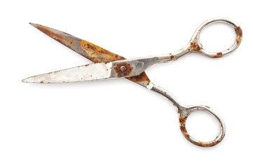 old rusty scissors isolated on white
