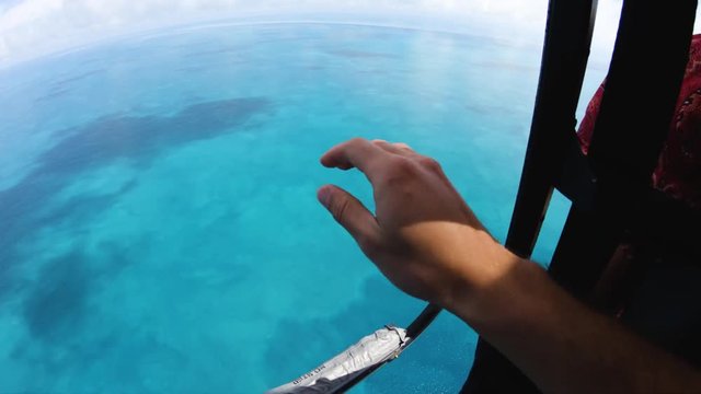 POV, flying over ocean in helicopter