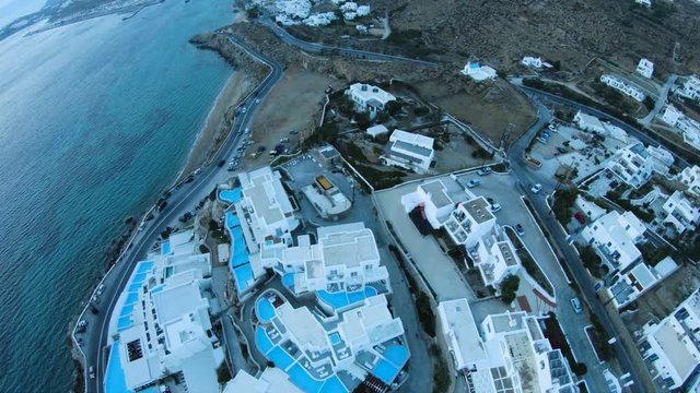 Tilt down aerial, coastal city of Mykonos