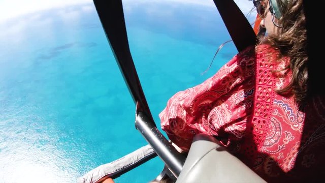 Flying over tropical ocean in Greece, helicopter POV