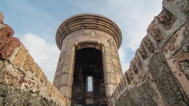 Motion time lapse hyperlapse of the city wall of San Juan featuring a historic watch tower