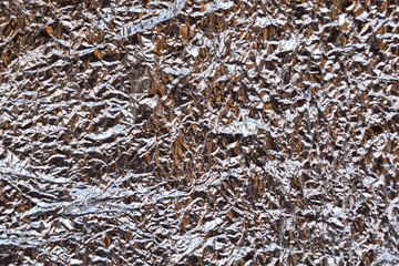 Glitter surface of rumple metal silver foil. Background, texture