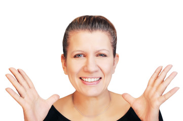 Woman cheerfully shakes hands and smiles genuinely on a white background. A woman is happy because she has a good news