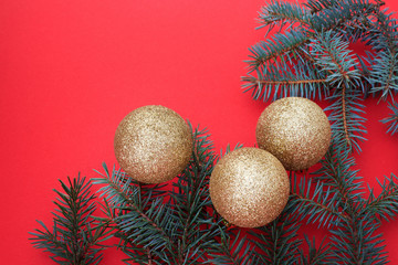 Christmas decorations on a red background. The concept of traditional decor for Christmas.