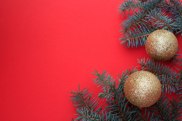Christmas decorations on a red background. The concept of traditional decor for Christmas.