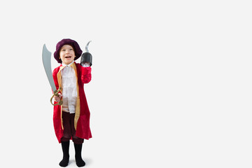 Happy boy dressed up in a pirate Halloween Costume