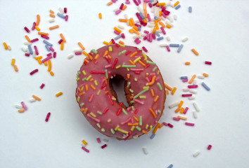 donut donuts sprinkles on doughnuts pink bright sugar strands background