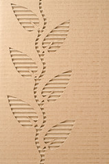   Leaves cut out on a corrugated cardboard 