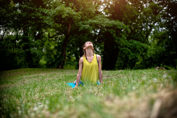 Young woman exercing in nature