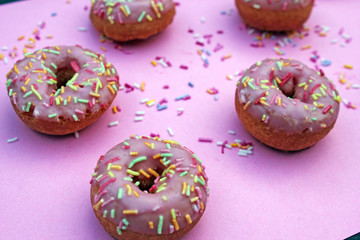 donut donuts sprinkles on doughnuts pink bright sugar strands background