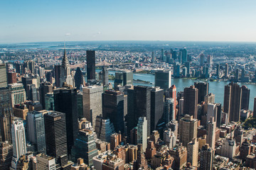 Aerial view of New York City - USA. Manhattan downtown skyline and skyscrapers from the Empire State Building in the morning.