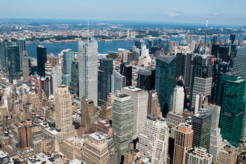 Fototapeta premium Aerial view of New York City - USA. Manhattan downtown skyline and skyscrapers from the Empire State Building in the morning.