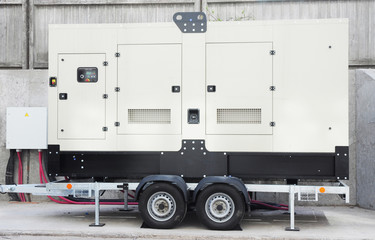 Backup Generator  othe trailer wheels connected to the control panel with cable wire. Power backup generator.