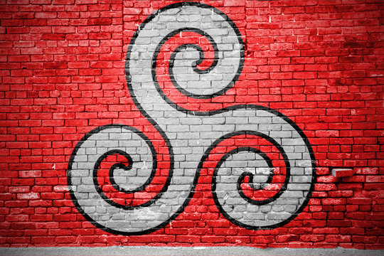 Triskele BDSM Symbol Ziegelsteinmauer Graffiti