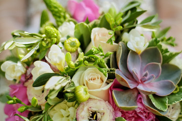Wedding bouquet in the bride's hands, succulents